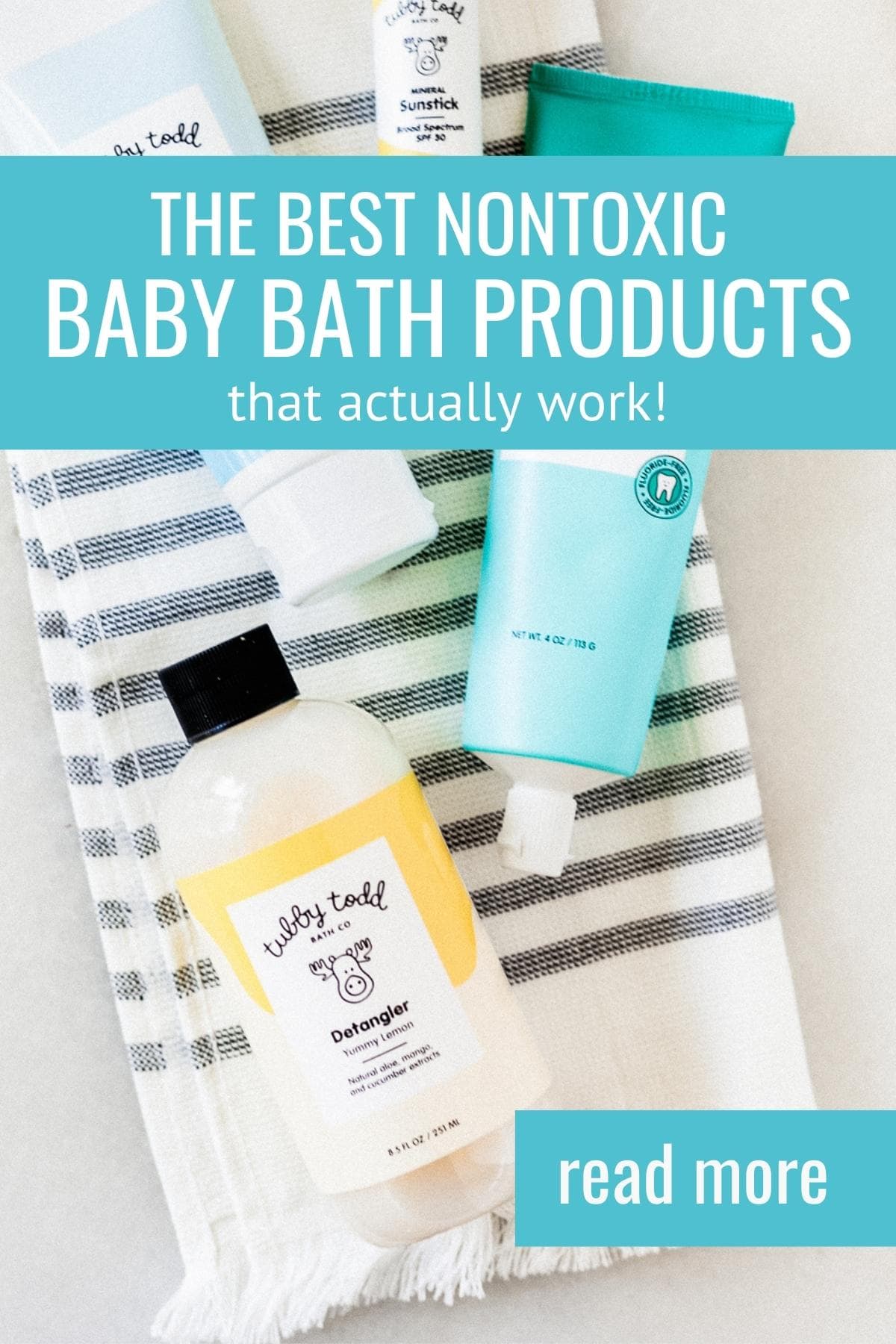bottles of nontoxic baby bath products on a striped towel with text overlay.