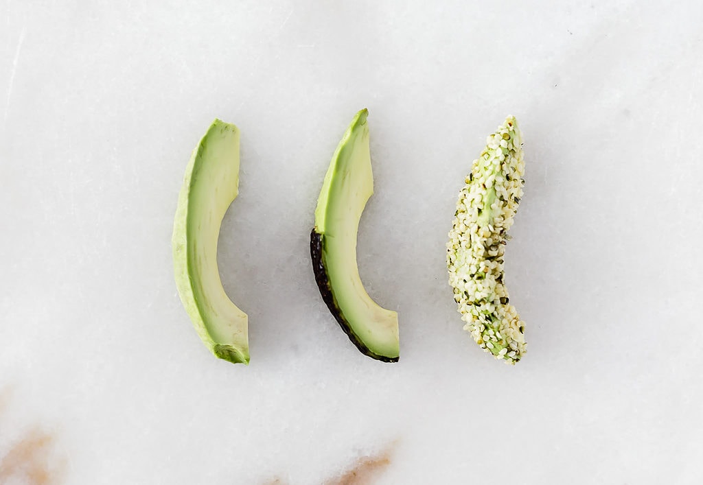 sliced avocado shown three ways for baby led weaning