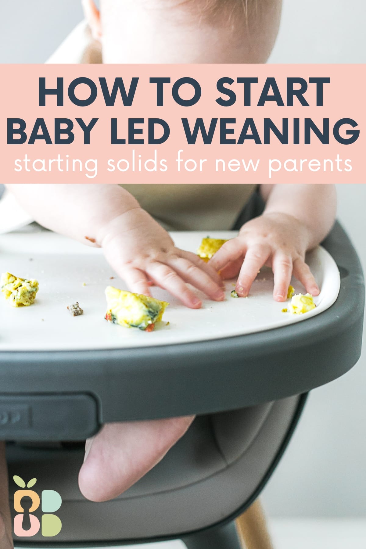 baby in a high chair with hands grabbing food on the tray with text overlay.