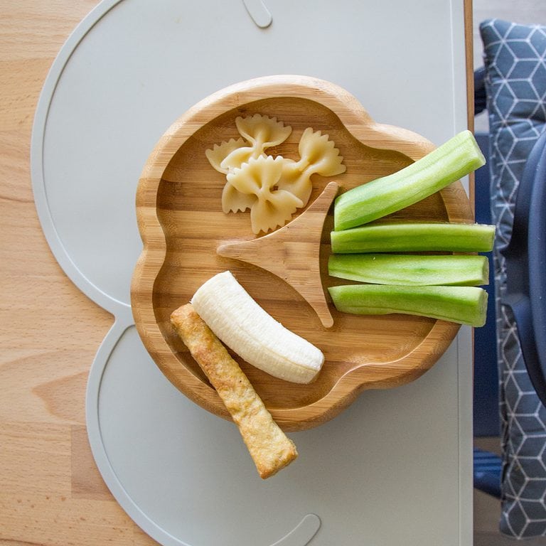 plate of baby led weaning food on a grey mat