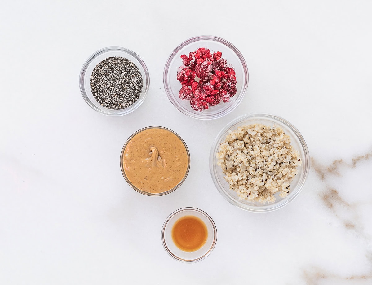 overhead view of ingredients needed to make no bake pbj quinoa balls for babies.