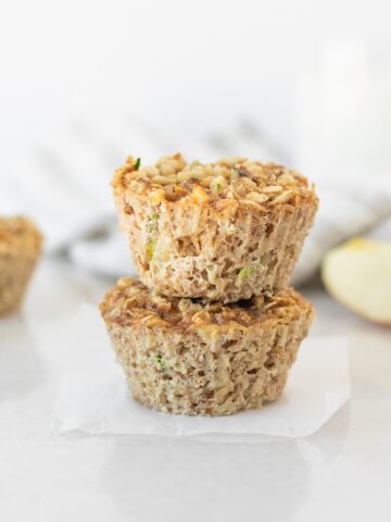 two zucchini apple baked oatmeal cups stacked.