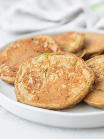 plate of baby zucchini bread pancakes.