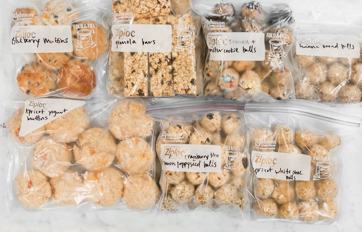 several healthy snack balls and muffins in freezer bags to freeze for postpartum.