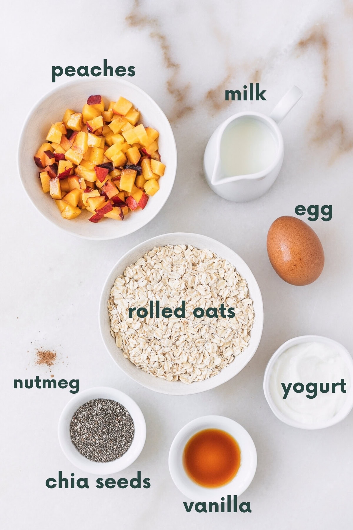 overhead view of ingredients needed to make peach baked oatmeal for baby with text overlay.