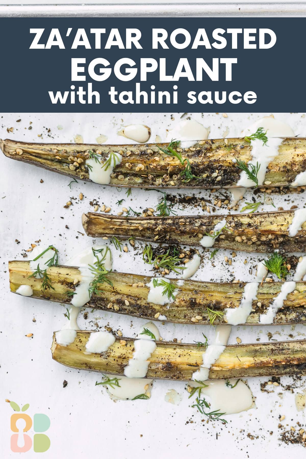 wedges of zaatar roasted eggplant drizzled with tahini sauce and topped with fresh herbs with text overlay.