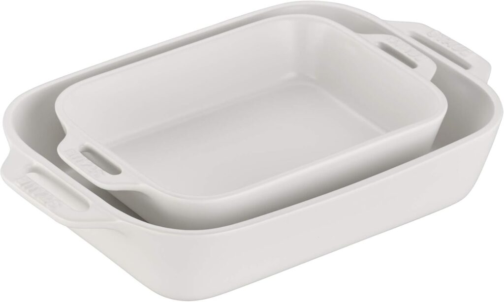 set of white staub baking dishes.