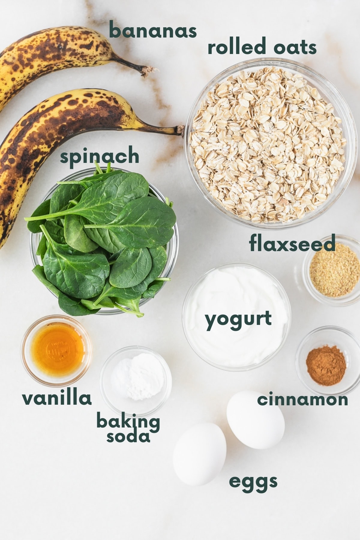 ingredients needed to make baby green spinach muffins with text overlay.